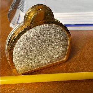 Change purse by Sergio Rossi 2” high x 2” wide.